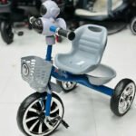 Kids-Tricycle-with-Robot-Headlight-&-Basket-–-Stylish,-Sturdy-&-Fun-Ride.-Orange-strip